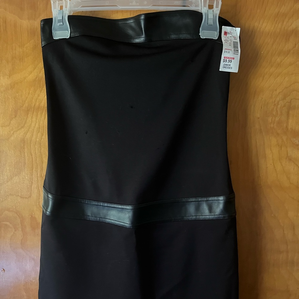 Frederick’s of Hollywood strapless black dress.
